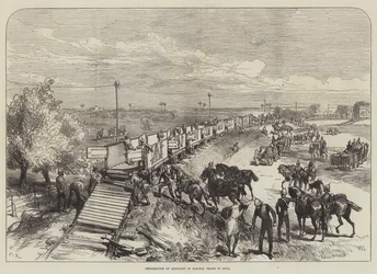 Inscheping van artillerie in treinen in India
